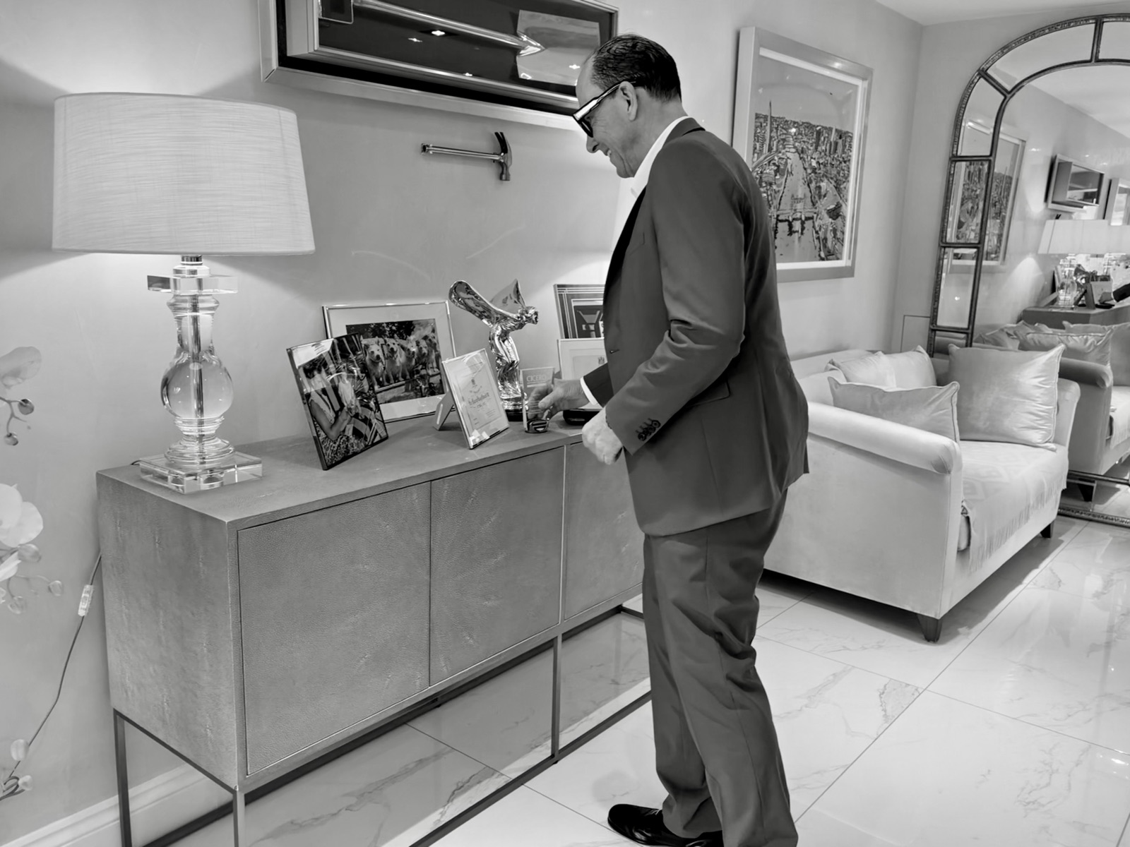 Mark Dyer Property: Mark Dyer with his awards and memorabilia at home
