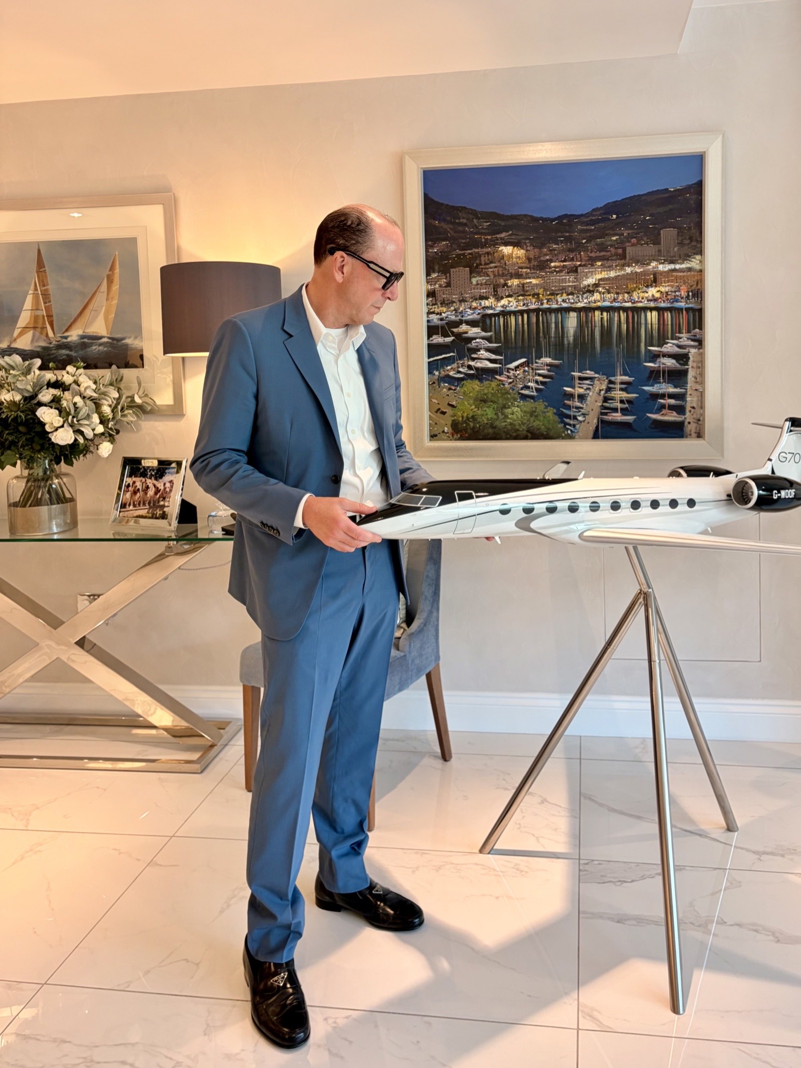 Mark Dyer: Mark Dyer with a model Gulfstream G700 private jet